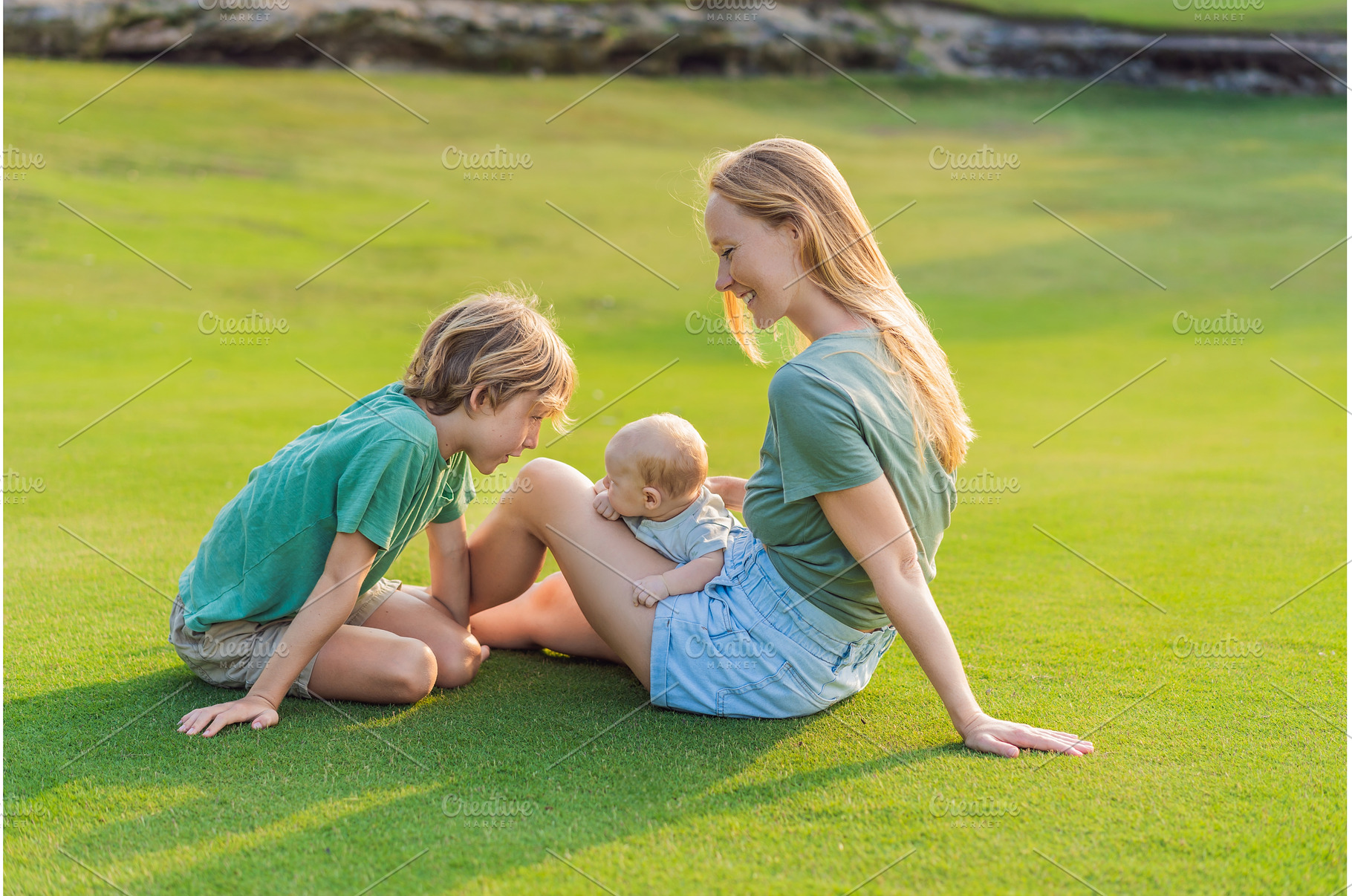 Mother, older son, and newborn baby, a Nature Photo by Elizaveta Galitskaya