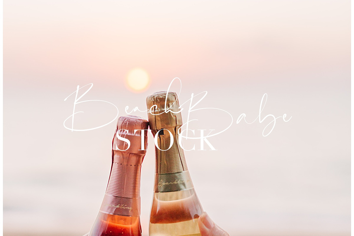 Clinking moscato bottles on a beach, a Food & Drink Photo by Beach Babe Stock (Photo 2 of 2)