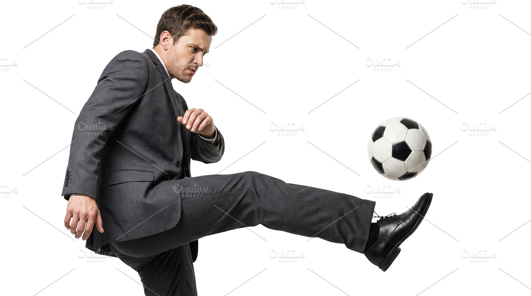 a man kicks a soccer ball, a Person Photo by itakdalee