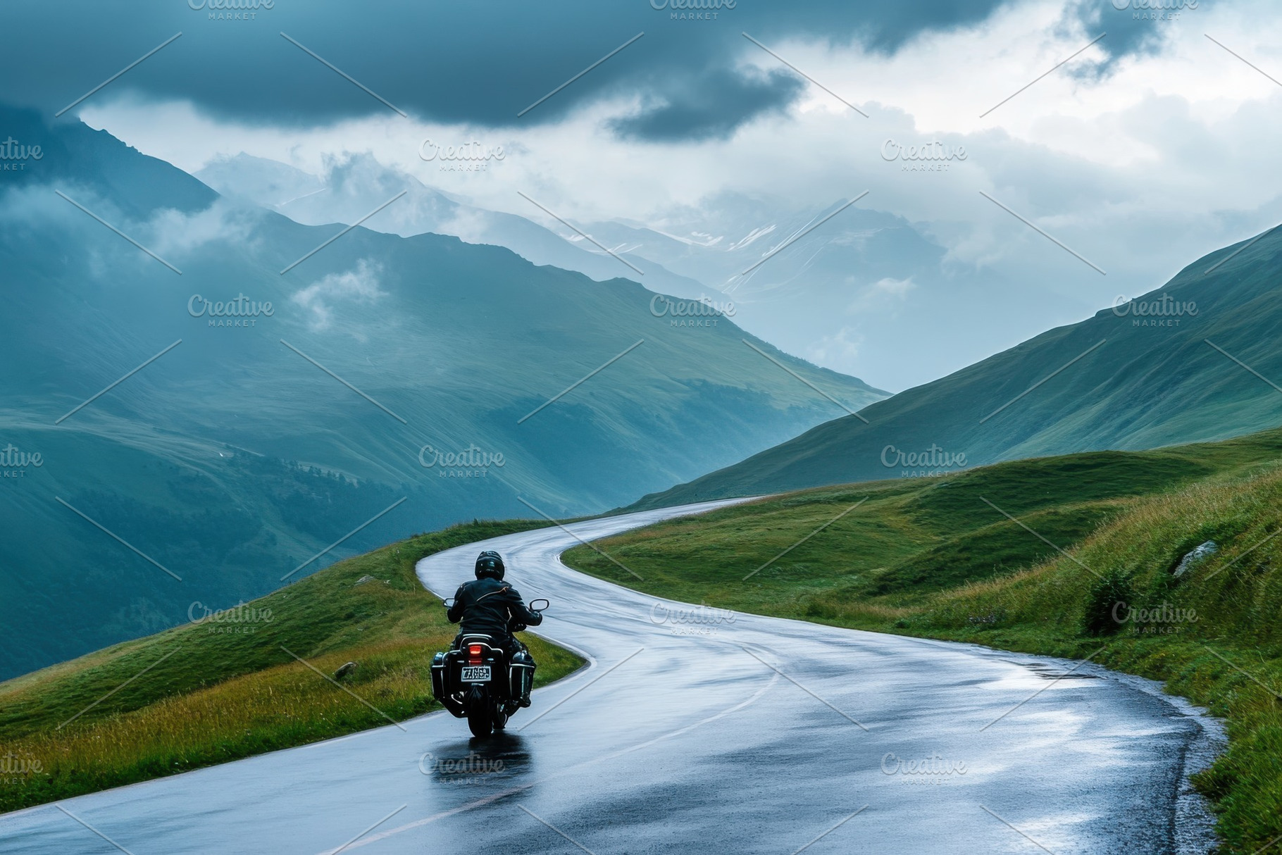 Motorcyclist Rides Winding Mountain, a Photo by Pixeness Studio