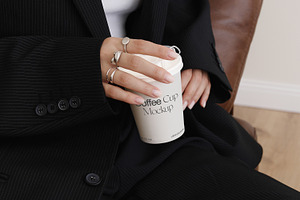 Coffee Cup in Hand Mockup PSD, a Cups & Container Mockup by Feel This