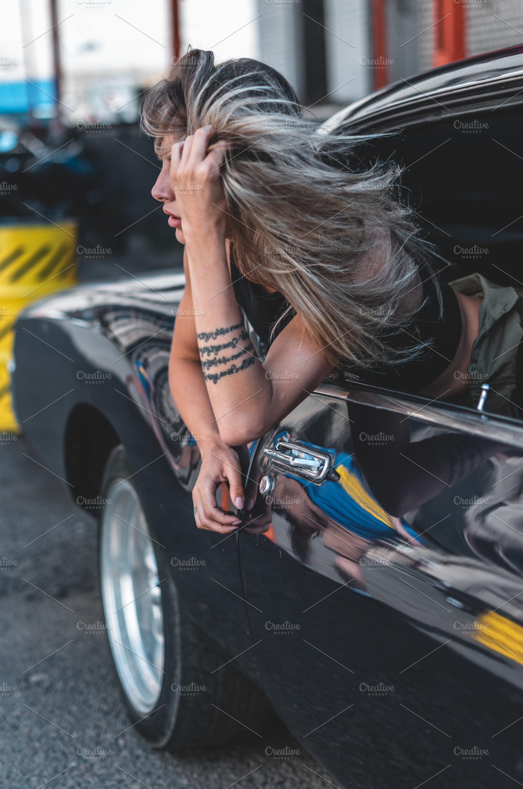 Beautiful caucasian female posing wi containing portrait, female, and girl, a Transportation Photo by supamotion