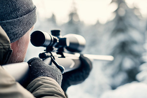 Hunter aiming a scoped rifle, a Sports & Recreation Photo by MistyDay