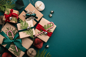 Christmas gift boxes on turquoise ba