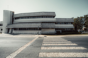 Concrete Facade and Stone Crosswalk, an Architecture Photo by SkyNext