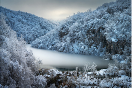 Scenic view of frozen ice lake and, a Nature Photo by den-belitsky