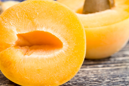 natural sliced orange peaches or apricots, a Photo by MyPhotos