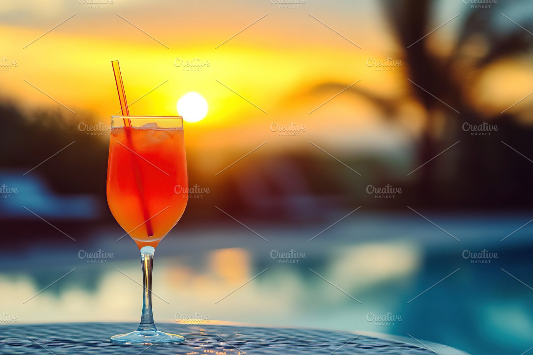 Refreshing glass of vibrant fruit cocktail against a stunning sunset backdrop, a Food & Drink Photo by AlyaAnd