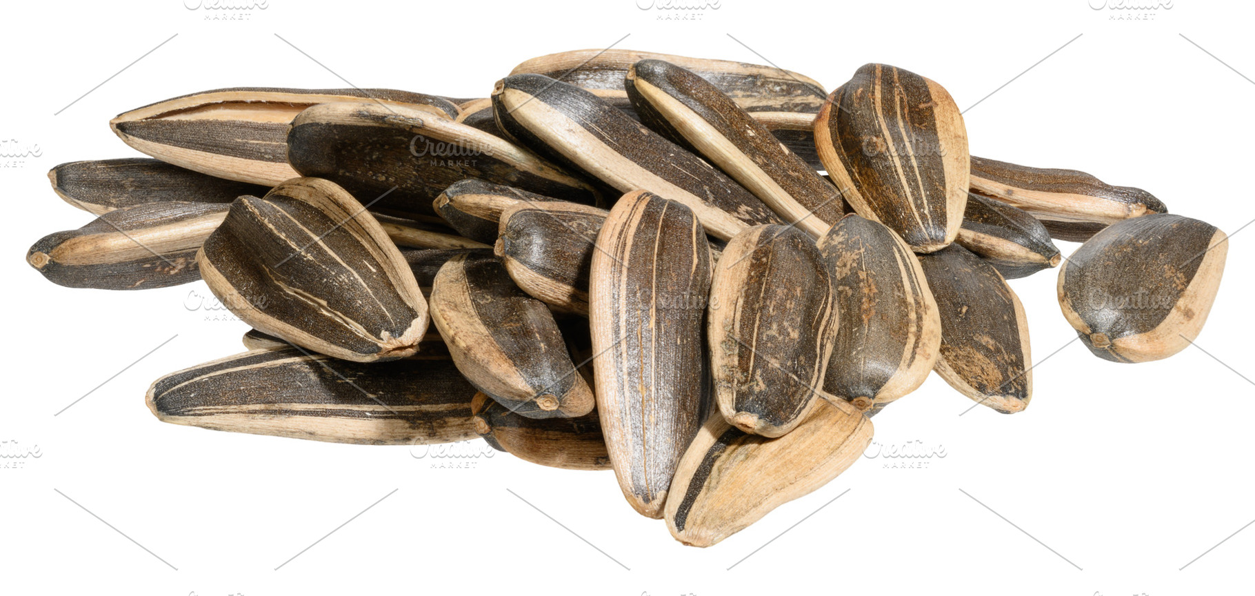 A pile of peeled sunflower seeds on isolated background, a Food & Drink Photo by ndanko