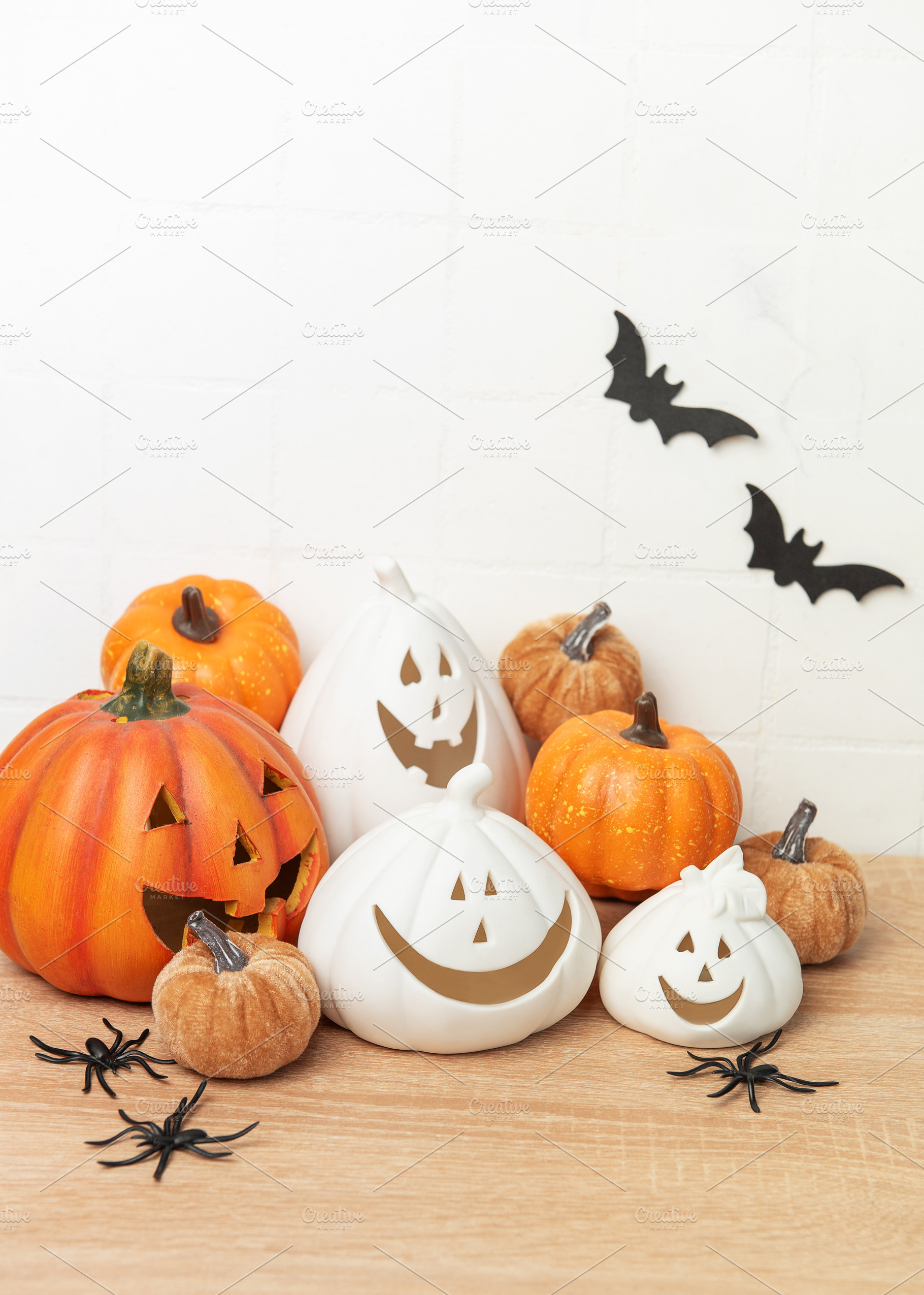 Halloween pumpkins with bats and spiders decoration, a Holiday Photo by Olena Rudo