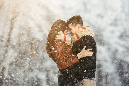 Happy couple in snow park stock photo containing amazing and snow