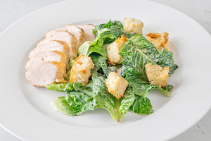 Classic Caesar salad, a Food & Drink Photo by Alexander Prokopenko