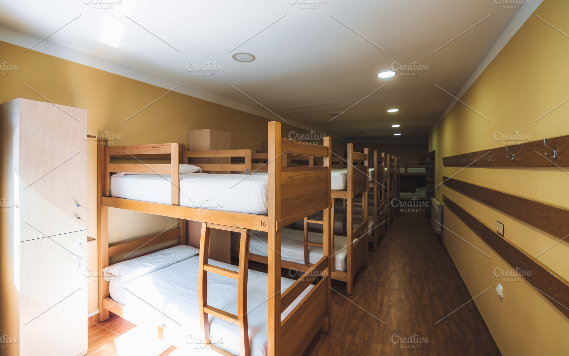 Bunk bed hostel dorm interior, an Architecture Photo by SkyNext