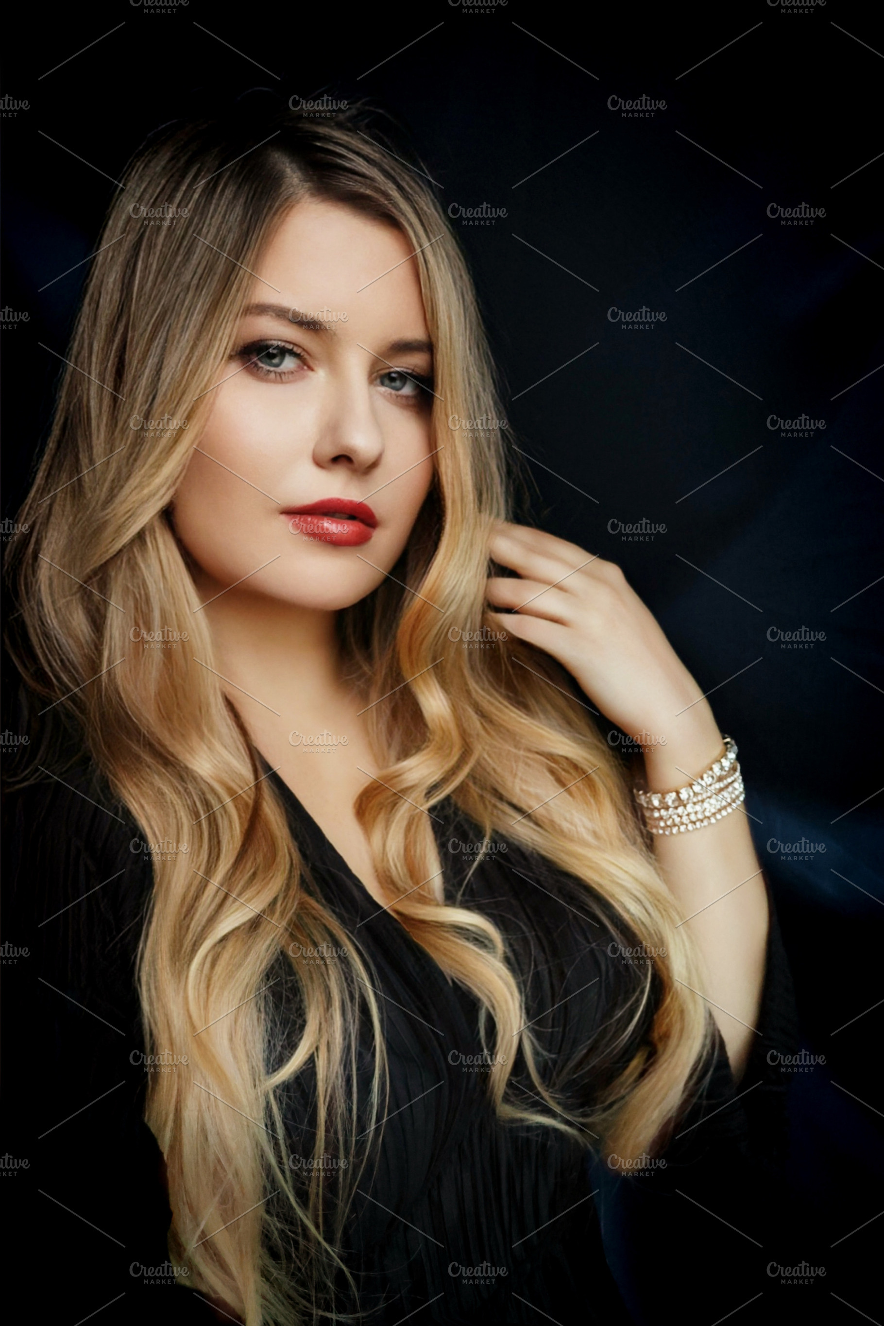 Blonde woman posing with elegant makeup and jewelry, representin, a Person Photo by Studio ANNA