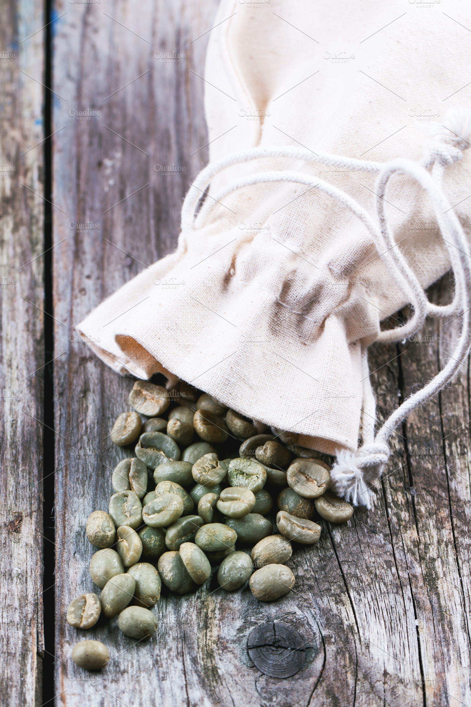 Green and brown coffee beans containing coffee, green, and coffe