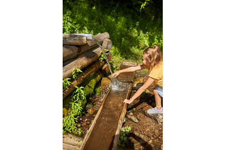 Child refreshing face at natural, a Nature Photo by IlliaBondarPhotography