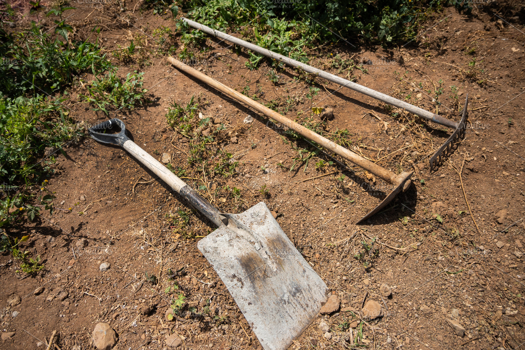 Garden Tools on Dry Soil, an Industrial Photo by etorres69