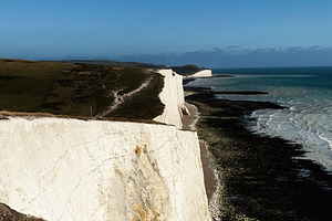 Cliffs along the Seven Sisters coastline in East Sussex with white chalk format, a Nature Photo by AS photostudio