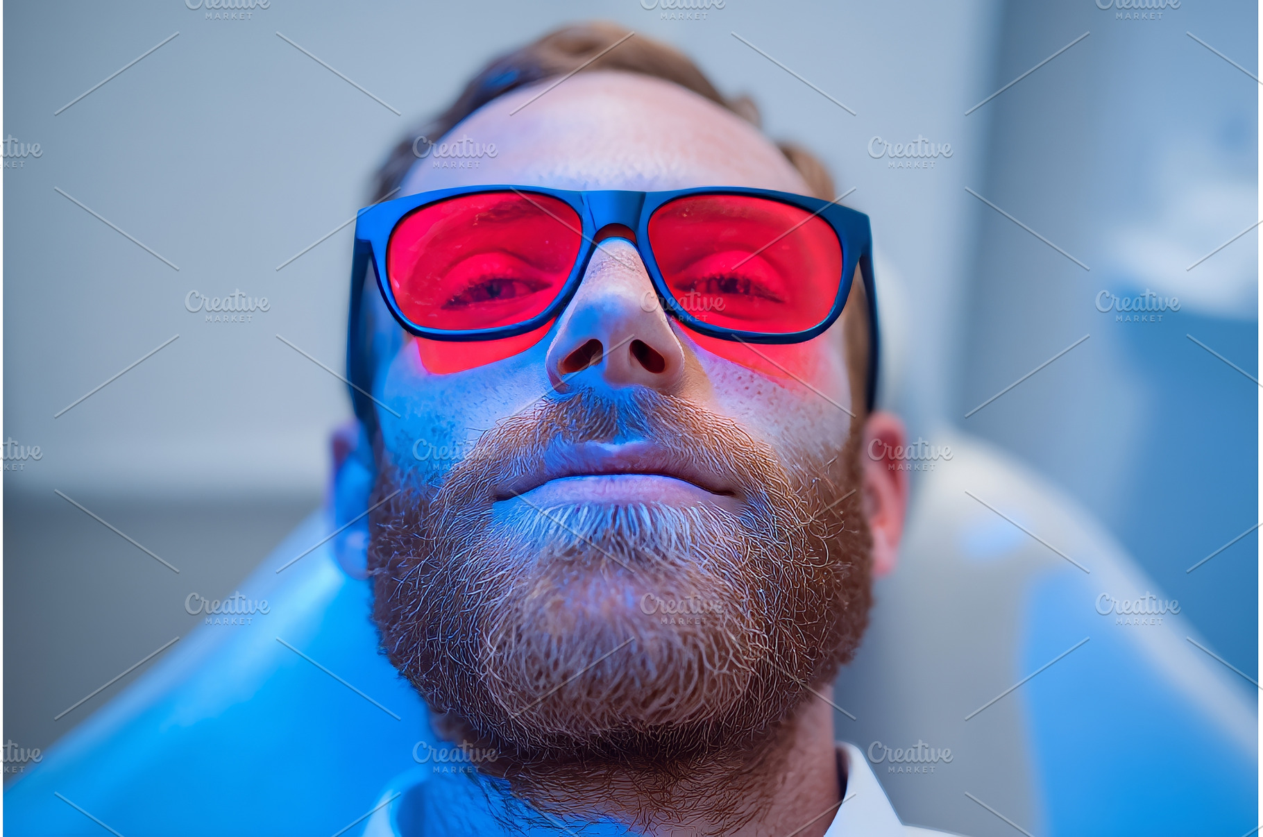 A man undergoes teeth whitening, a Health & Medical Photo by ZinetroN
