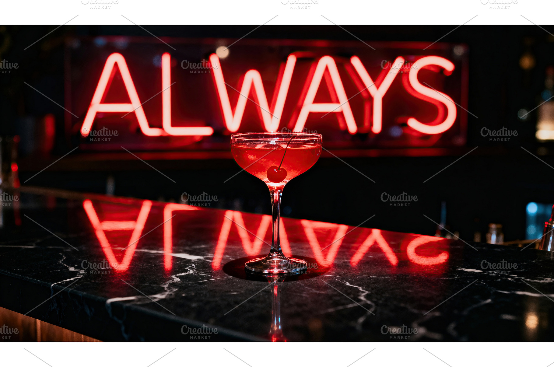 Cocktail glass with cherry on marble, a Food & Drink Photo by tilialucida