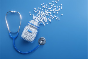 On a blue surface, a stethoscope is, a Health & Medical Photo by ZinetroN