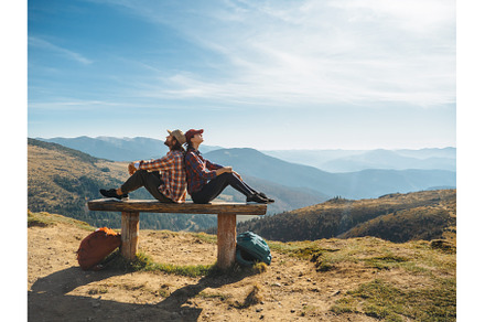 Couple of Hikers With Backpacks in