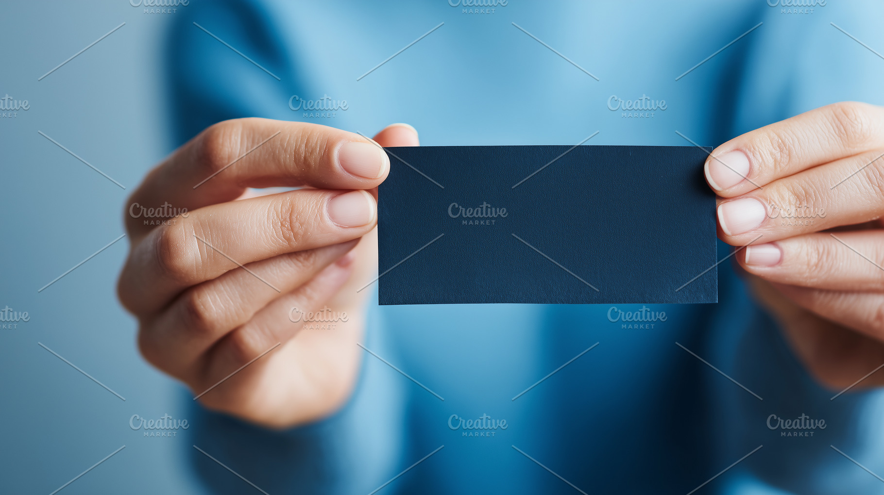 A person holding a blank dark card, a Business Photo by MistyDay