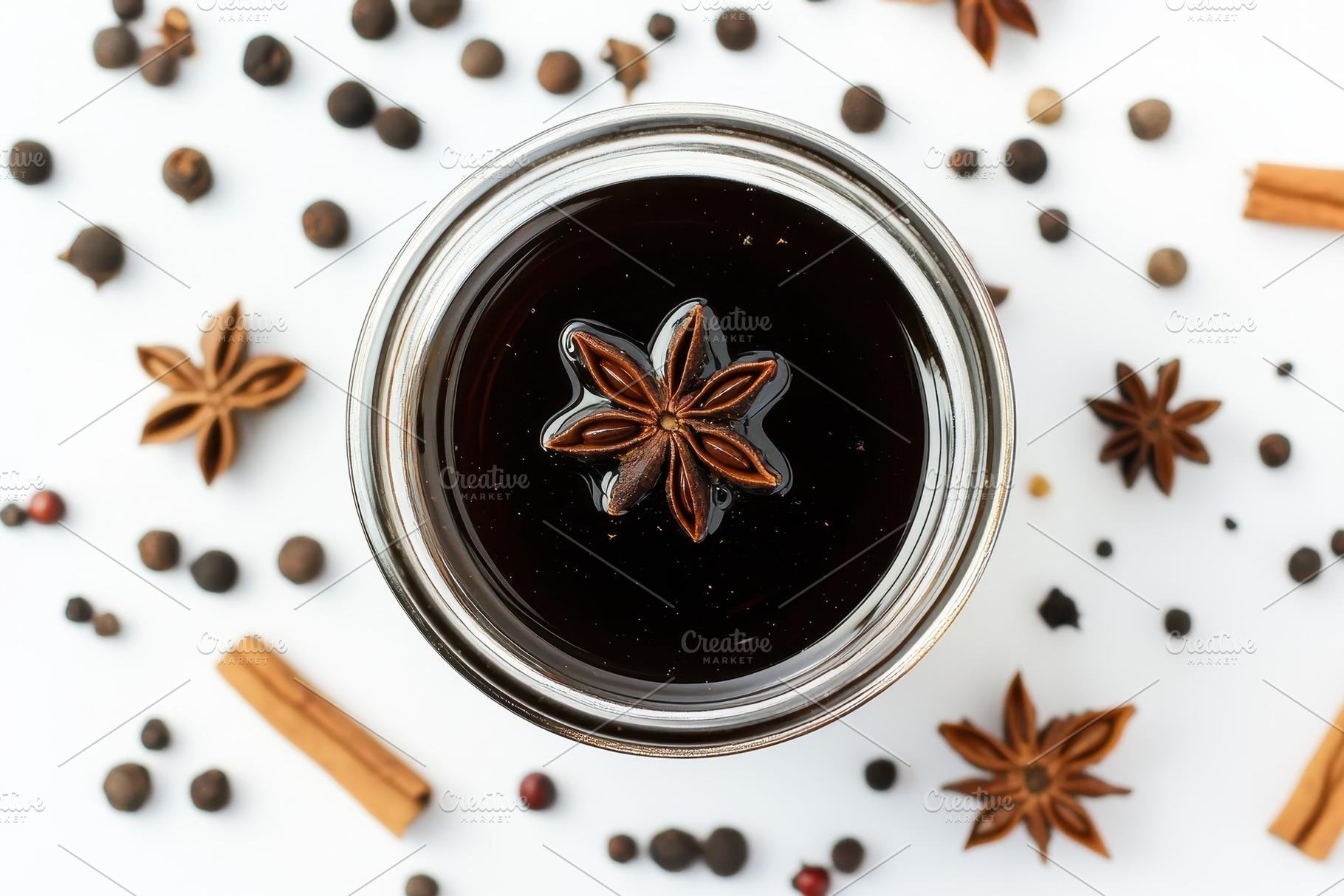 Glass jar filled with dark liquid, a Photo by Pavel_design