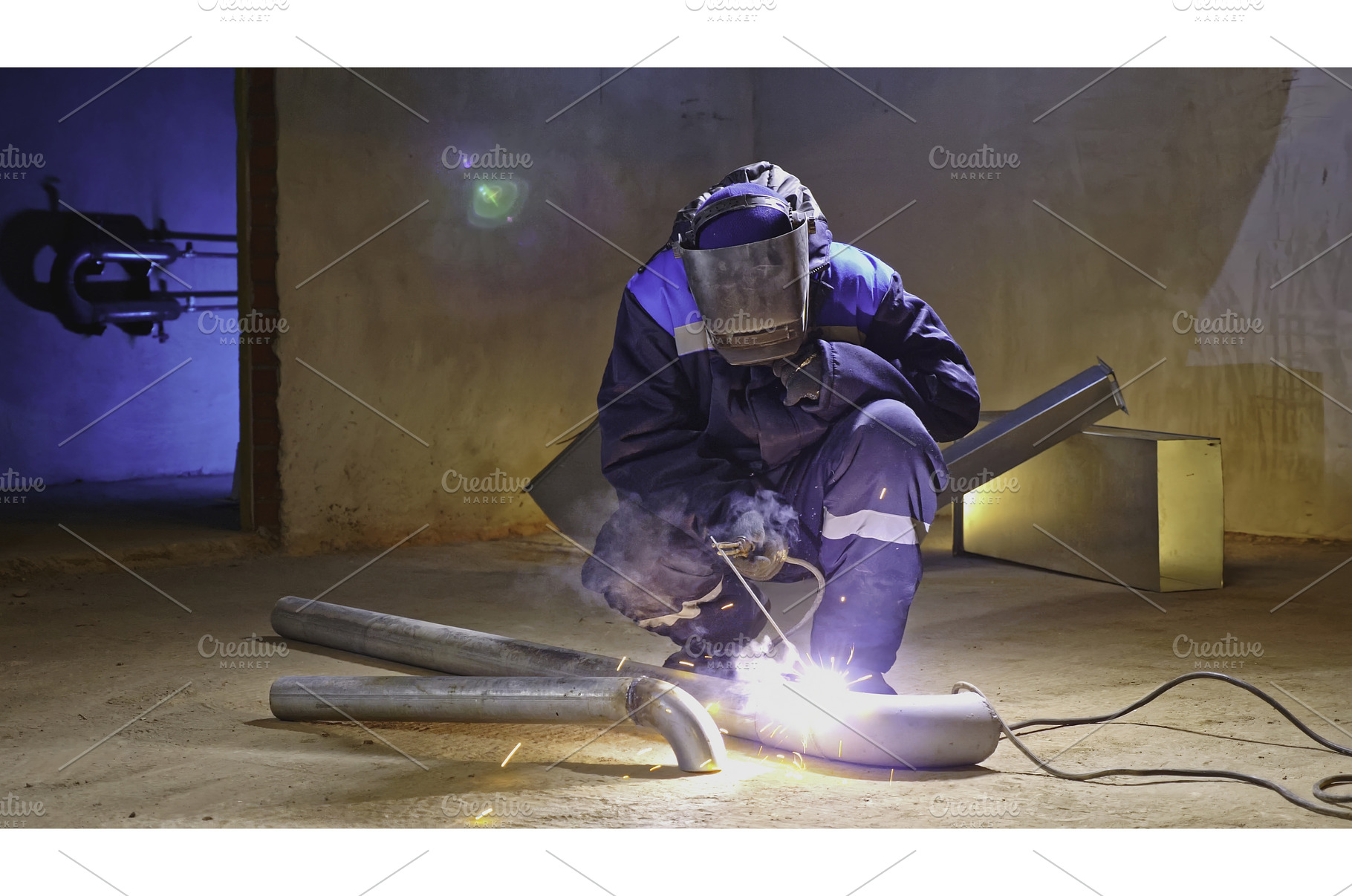 Man with welding at construction, an Industrial Photo by Media Whale Stock