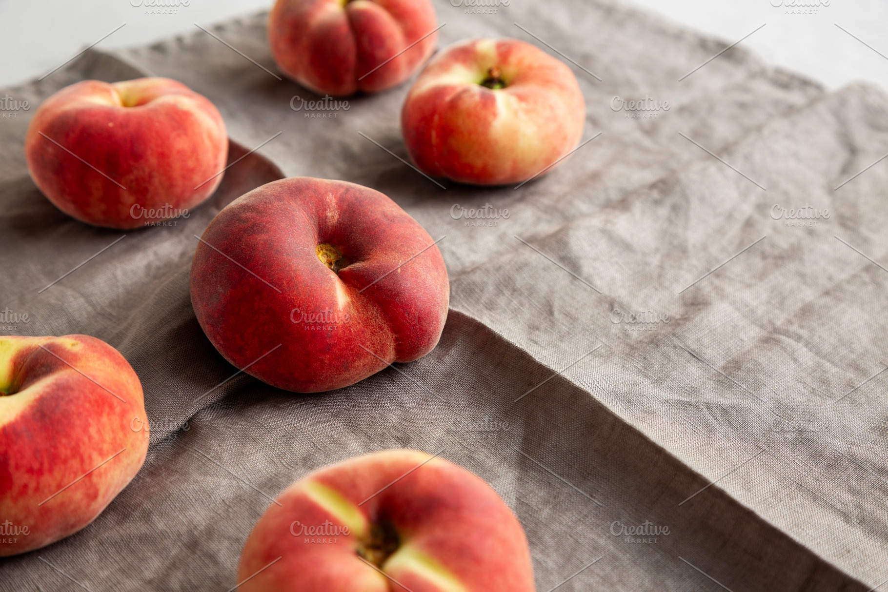 Fresh juicy ripe fig peaches, side view. Copy space., a Food & Drink Photo by LiudmylaChuhunova