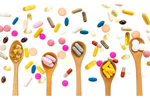 Various tablets and capsules, a Health & Medical Photo by yanadjana
