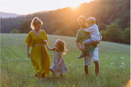 Happy young family spending time, a Person Photo by HalfPoint