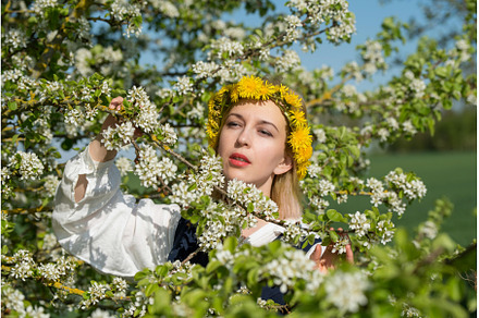 Beautiful woman in national dress, a Holiday Photo by COLORFUL