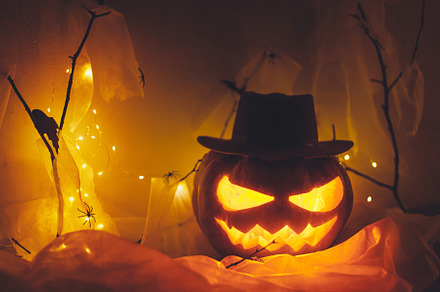 Happy Halloween! Jack o lantern carved pumpkin, spider web, ghos, a Holiday Photo by Sonjachni