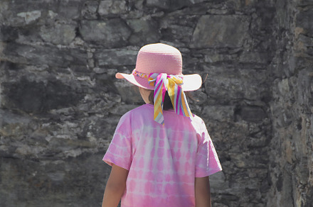 Girl walking at braganca castle, branganca, portugal