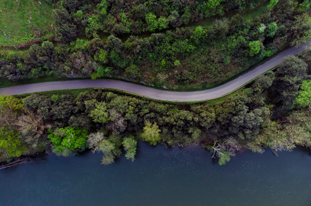 Aerial view of the Nalon river and a road in Candamo, Asturias Spain, a Nature Photo by CreativePhotoSpain