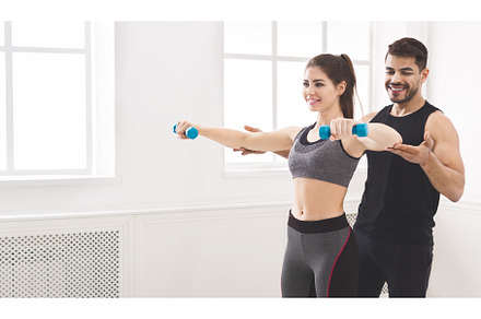 Personal trainer coaching young girl, a Sports & Recreation Photo by Prostock-Studio
