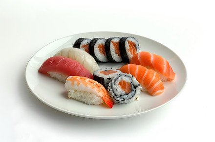 Assorted tasty sushi food in plate on white background, a Food & Drink Photo by AlyaAnd