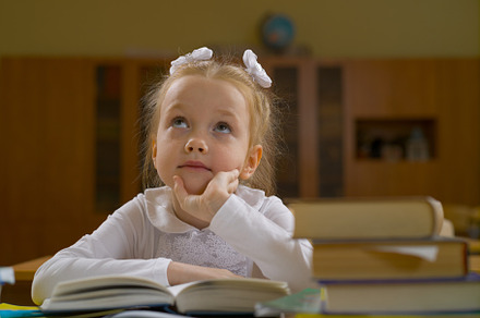 Little girl in school class at the l stock photo containing girl and school, a School & Education Photo by oleghz