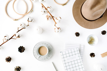 Female workspace with coffee, a Business Photo by Floral Deco