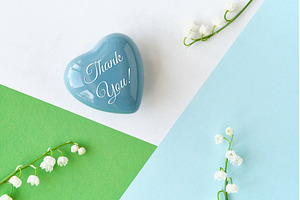 Blue heart-shaped object with text, a Photo by tilialucida