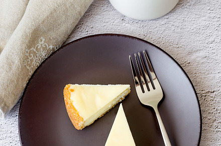 Piece of classical Cheesecake New York Closeup View, a Food & Drink Photo by vimart