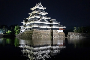 Night view of Matsumoto Castle reflecting in the water, Japan, an Architecture Photo by GoodGoods