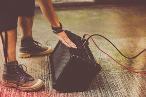 Guitar amp containing jazz, outdoor gig, and music