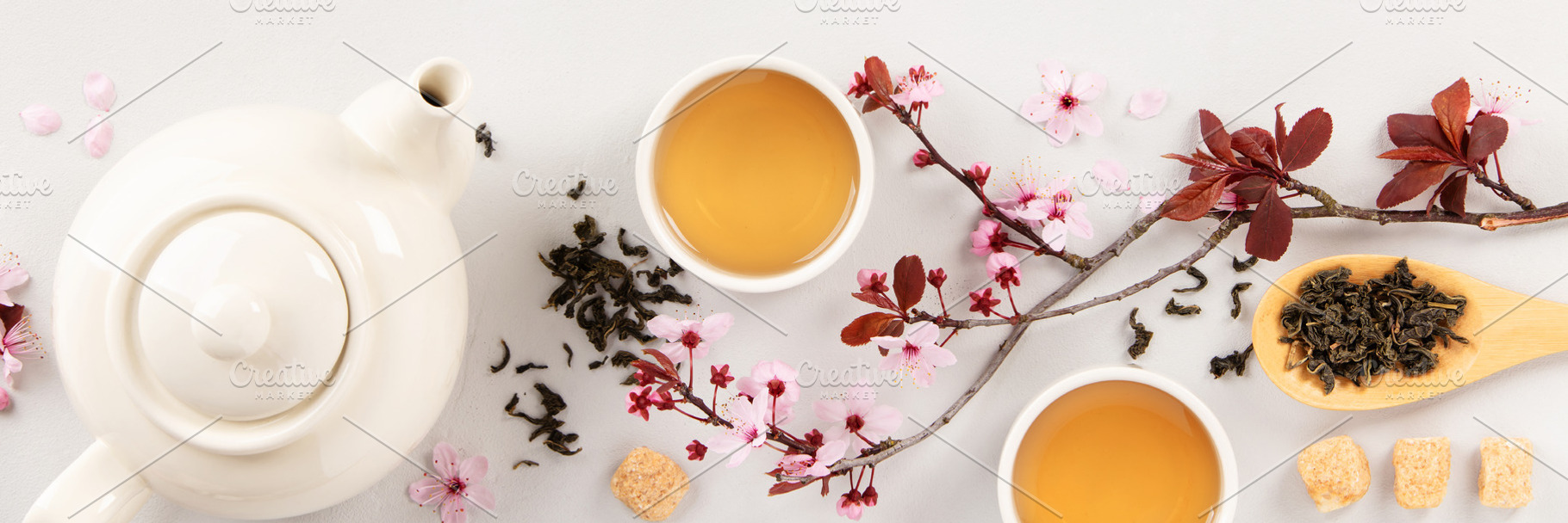 Tea Composition with Cherry Blossoms and Teapot Copy Space, a Food & Drink Photo by Natalia Klenova's Shop