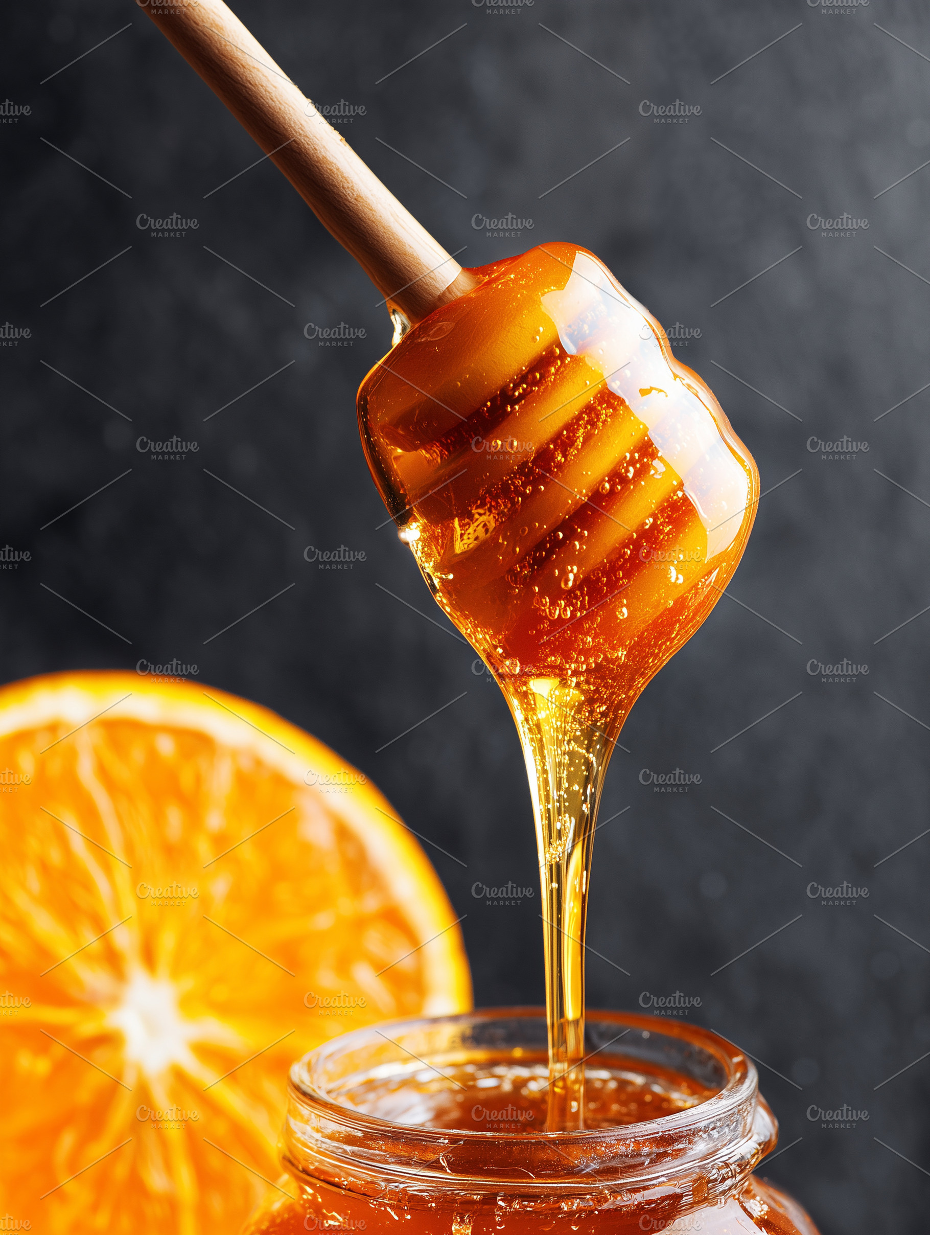Golden honey dripping from a wooden, a Food & Drink Photo by MistyDay