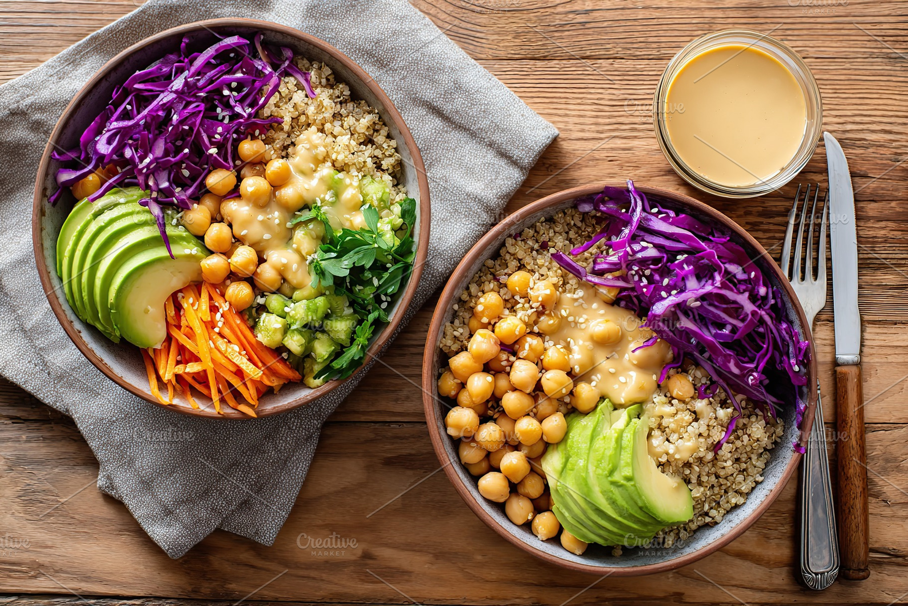 Colorful vegan bowl featuring quinoa, avocado, and purple cabbage served on a w, a Food & Drink Photo by AlyaAnd