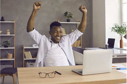 Dark-skinned man happily raises his, a Person Photo by StudioRomantic