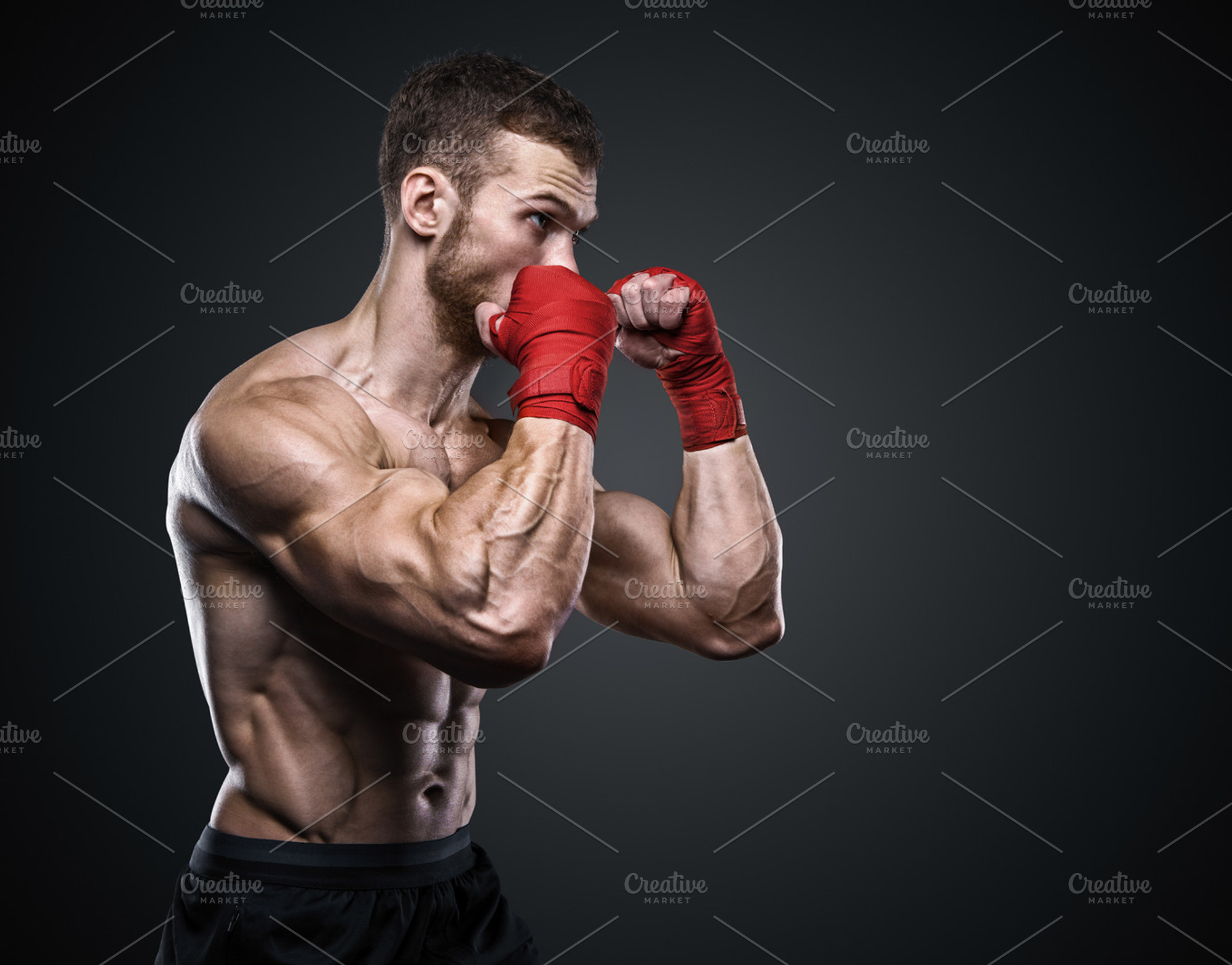 Mma fighter preparing bandages for training featuring boxing, fighter, and, a Sports & Recreation Photo by sport&beauty stock photo
