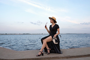 Woman in polka-dot dress gazes, a Person Photo by Elena Vagengeim